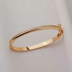 Pulseira dourada cravejada cristal