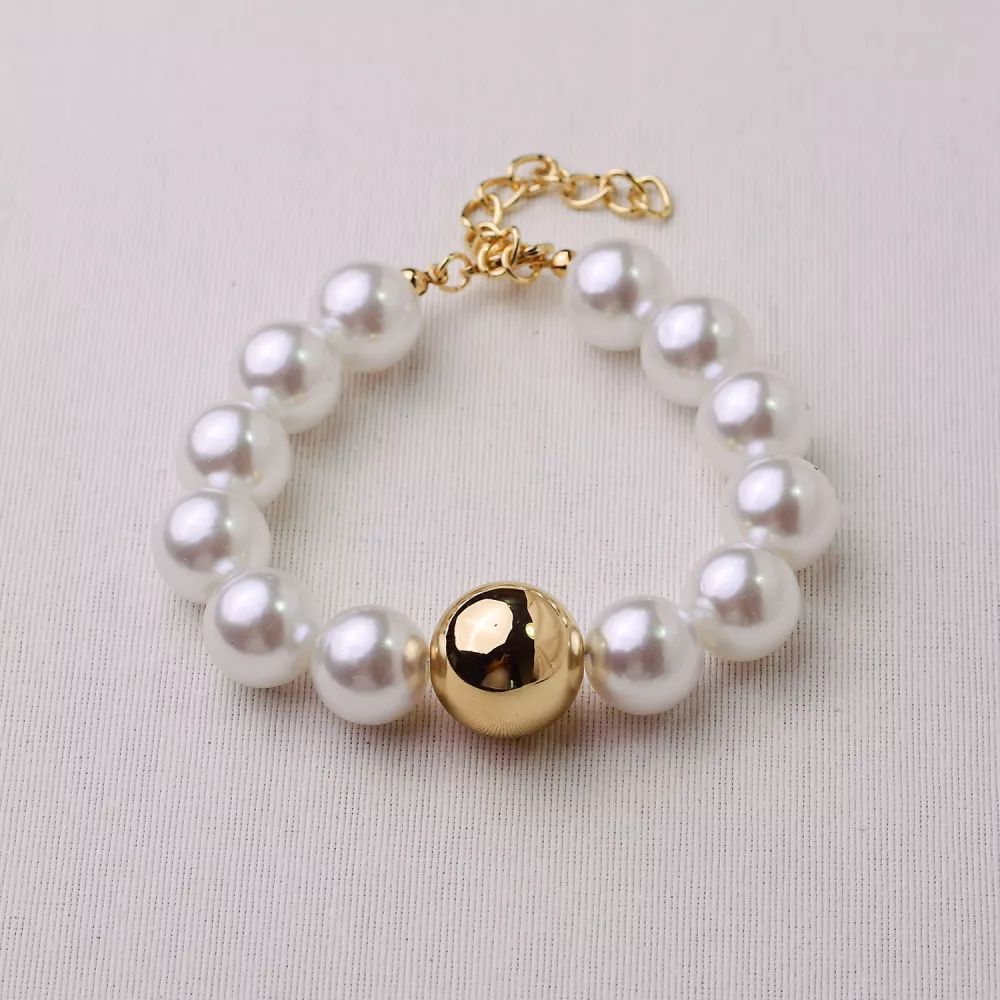 Pulseira dourada pérolas e esfera 22+5cm